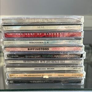10 Music CDs New in shrink wrap Natalie Cole Seal Santana Manhattan Transfer etc